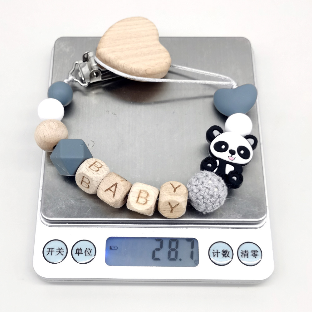Houten gepersonaliseerde babyf - Baby Teethers recensie en prijs